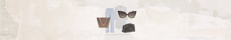Dette er et billede med en masse accessories som solbriller, bukser, tunika, toilettaske, armbånd, halskæder og meget mere. 